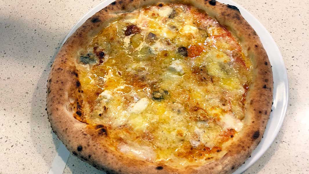 「最も『チーズな』ピザ」!? 世界記録を達成した料理に隠された、111個の秘密