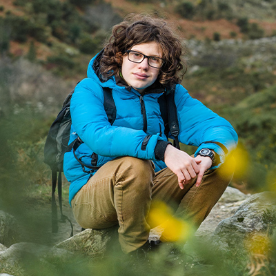 Dara McAnulty in a blue overcoat