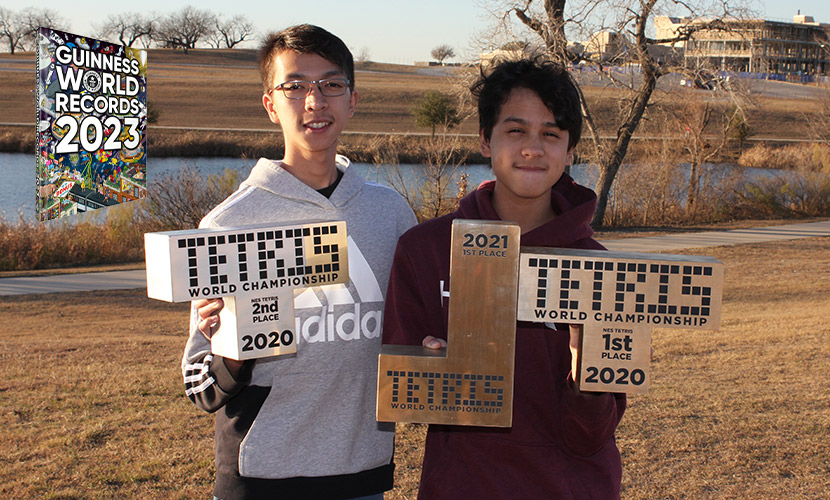 michael and his brother with tetris trophies 