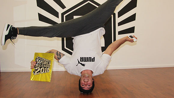 fastest-time-to-wrtie-a-text-message-while-performing-head-spins-header