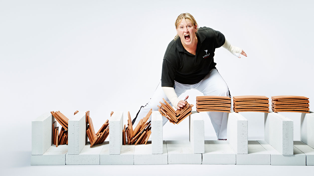 Most roof tiles broken in one minute by a female