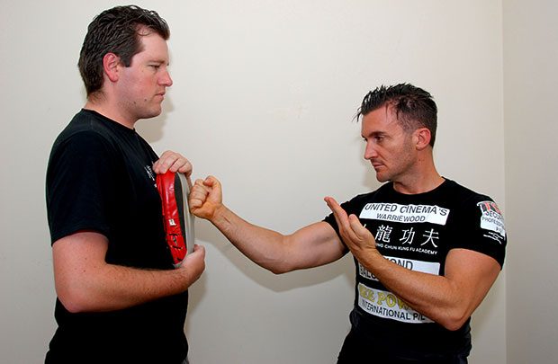 Most full contact punch strikes in one minute Robert Ardito