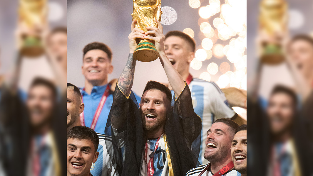 messi-holding-the-world-cup-730707