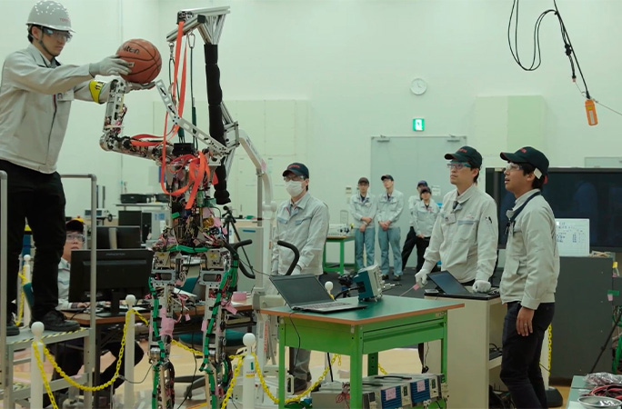 basketball robot being built by engineers