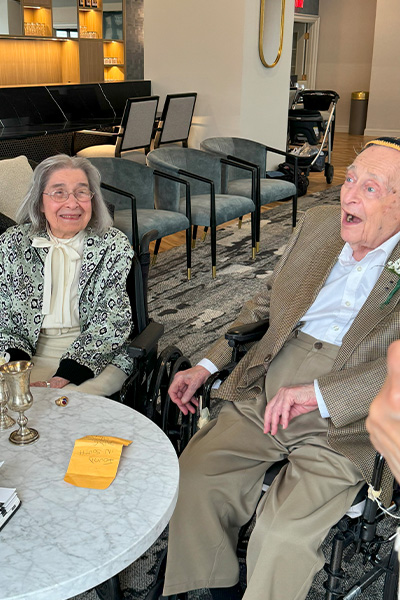 Marjorie and Bernie share a laugh