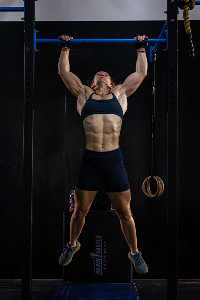 Jade hanging off the pull up bar