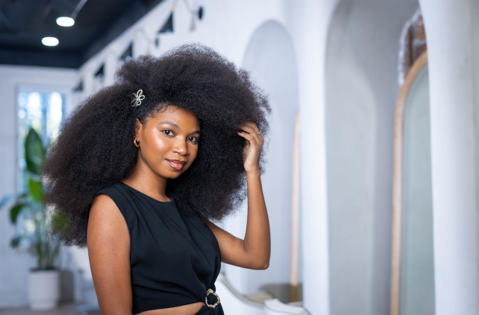Jessica posing and holding her hair