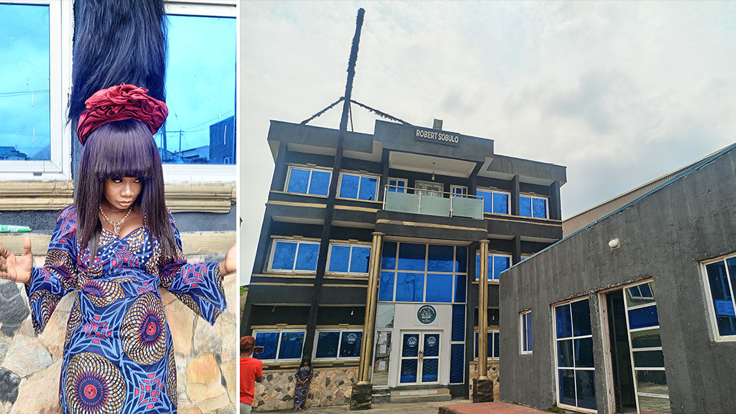 close up of Helen wearing the wig and shot showing it's taller than a building