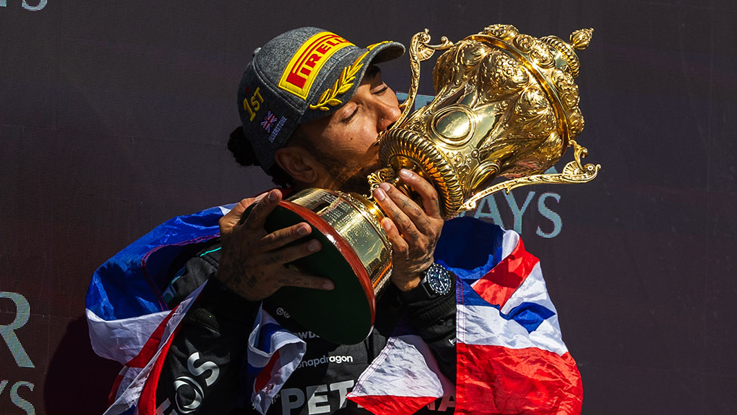 Image of Lewis Hamilton with a trophy