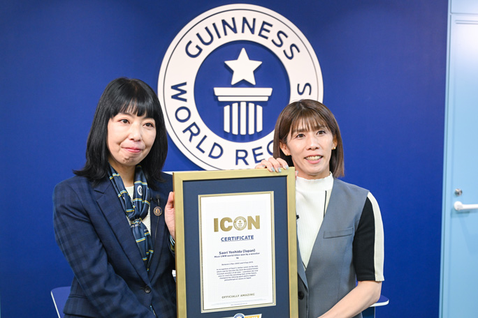 Saori Yoshida being handed the official ICON certificate