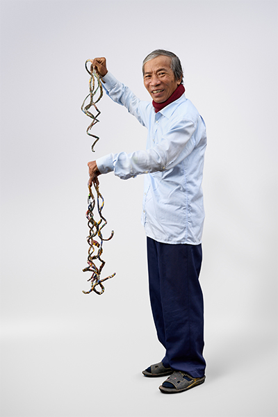 Mr Huyền against a white background