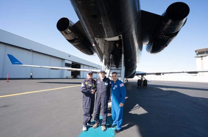 Robert and the Zero G professionals outside the plane