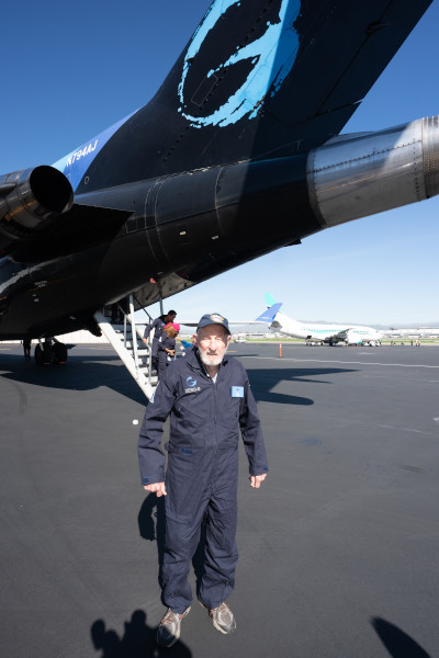 Robert standing outside of the plane