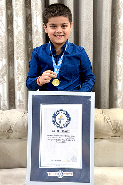 Avyukt with his GWR medal and certificate