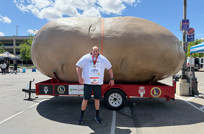 David in front of a potato