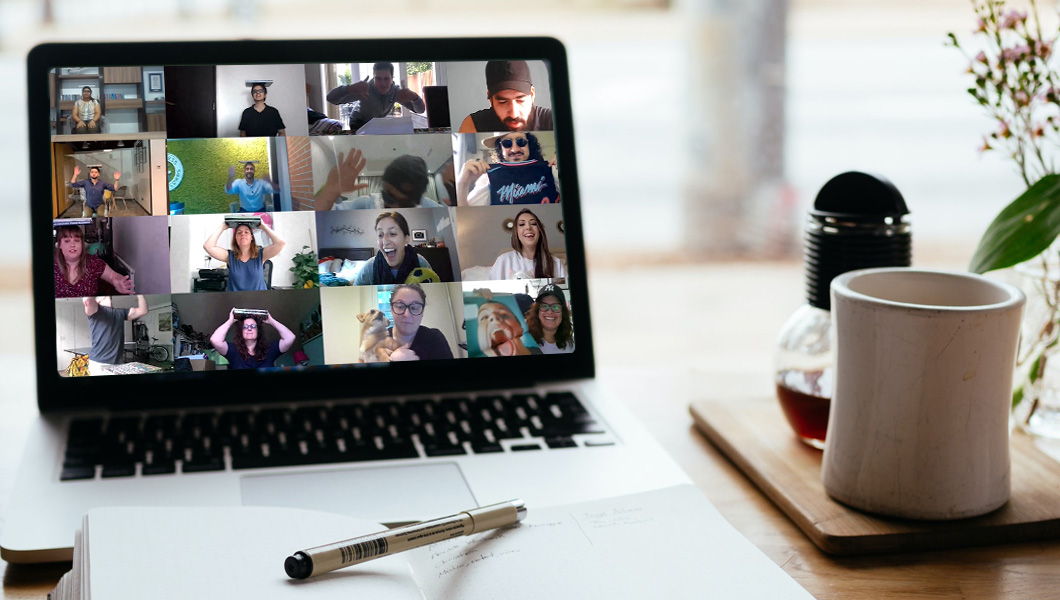 laptop with people on the screen