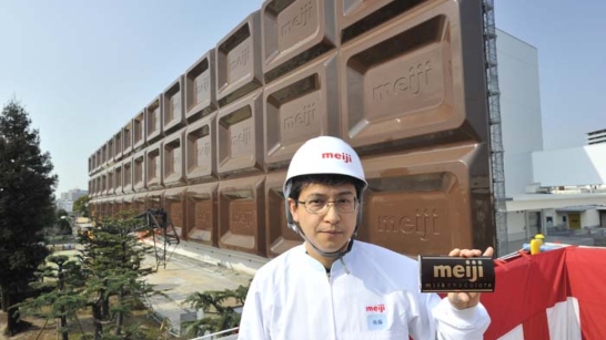 Man holding Meiji bar