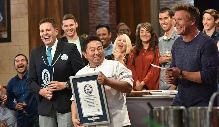 the f word with gordon ramsay with chef holding gwr certificate