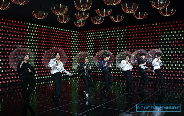 BTS performing while holding umbrellas